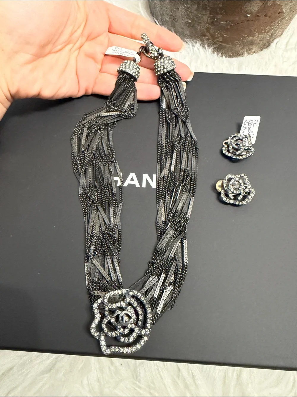CHANEL Black Multi-Strand Necklace with Crystal Camellia Pendant and Earrings